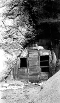Kaufman's Cave, where a Scottish prospector named Clarence Kaufman built a door over the entrance and lived for about four years.