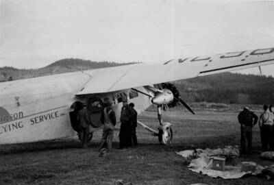 Unloading tri-motor at Chamberlain landing field