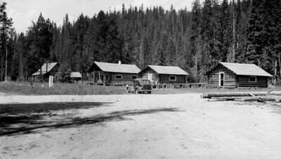 Photo text: '(Left to Right - cookhouse, bunkhouse, warehouse.)