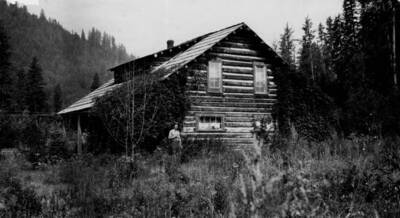 O'Hara Ranger Station, man stands outside