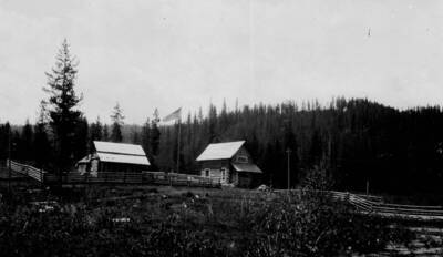 Red River Ranger Station, two buildings and flag pole