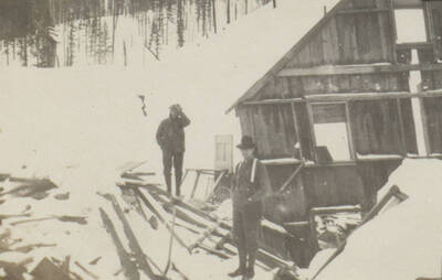 Photo text: 'Cruising in winter. Girard and Dahlgren.' This image is part of a pictorial narrative by William W. Morris titled 'Experiences on a National Forest'.