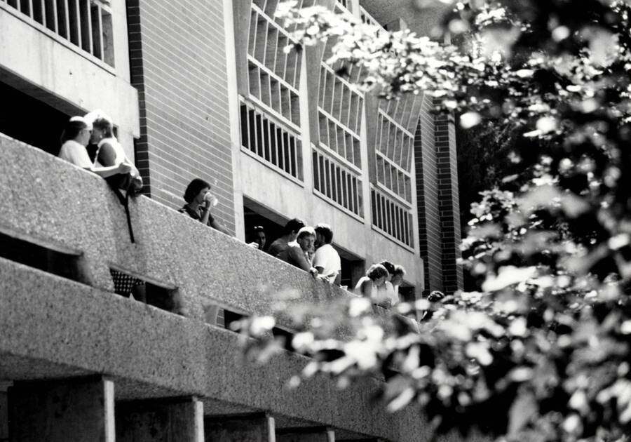 Students on the balcony of the University Classroom Center (now the Teaching Learning Center).