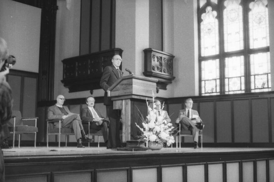 President Gibb speaking at a podium.