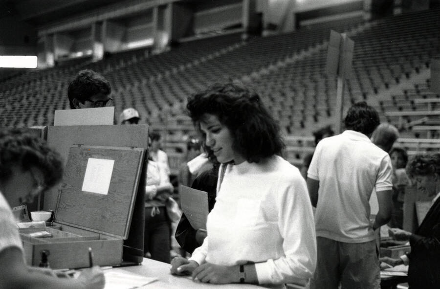 A student registering for classes in the Kibbie Dome.