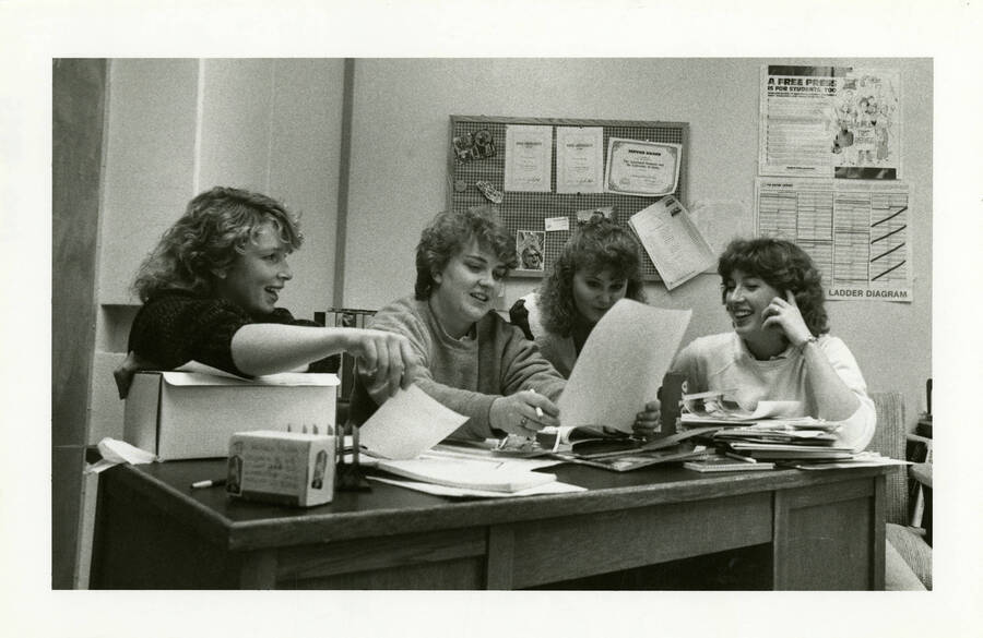 Women working on a student newspaper.