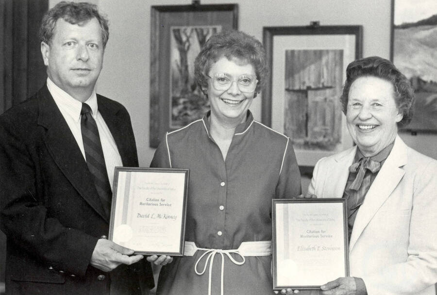 David L. McKinney and Elizabeth E. Stevenson receiving citations for meritorious service with Ms. Zakrajele.