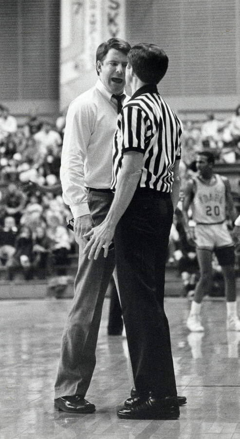 Idaho basketball coach, Tim Floyd, argues with a referee at the Kibbie Dome.