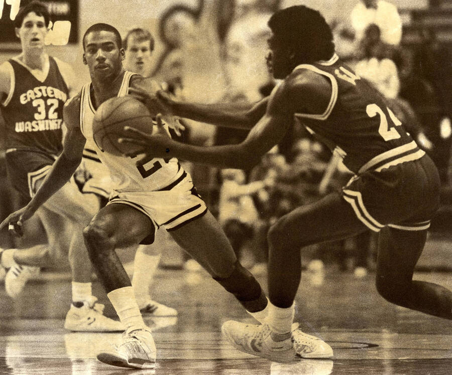 Vandals basketball vs. Eastern Washington University. Caption: ""Kenny Luckett #20 of Idaho tries to steal the ball away from Leroy Dean #24 of Eastern Washington. Idaho lost to Eastern Washington Saturday night.""