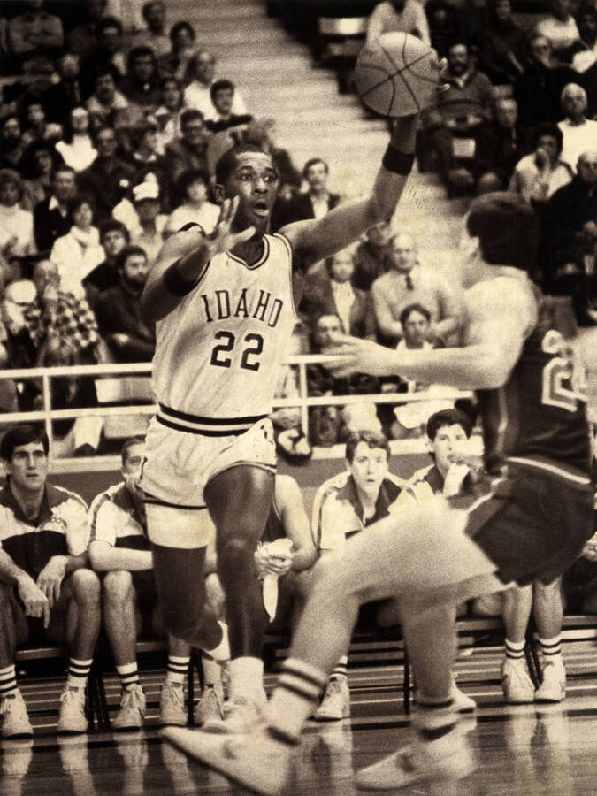 Basketball player, No. 22, of U of I basketball.  This photograph is likely from 1986-1987.