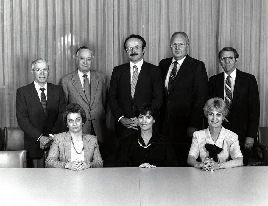 Idaho State Board of Education. Seated left to right - Roberta Fields of New Meadows, Cheney Hymas of Jerome and Diane Bilyew of Pocatello. Standing left to right - Mike Mitchell of Lewiston, Robert L. Montgomery of Boise, Dennis Wheeler of Coeur d'Alene, Charles M. Grant of Rexburg and Superintendent of Public Instruction Jerry L. Evans. Regents 1985-1986