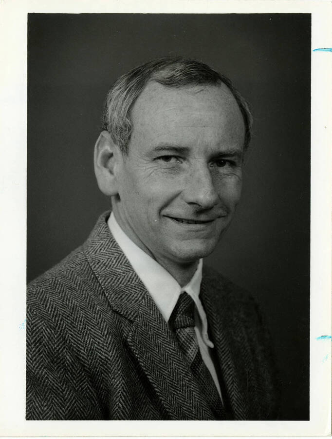 Charles D. McQuillen, Dean of Business and Economics,  posing for a portrait. Note on back of the photo reads: ""Charles D. McQuillen - Executive Director -Brd of Ed - Regents.""