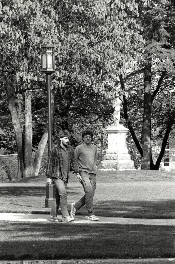 Students on Admin Lawn by the war memorial.