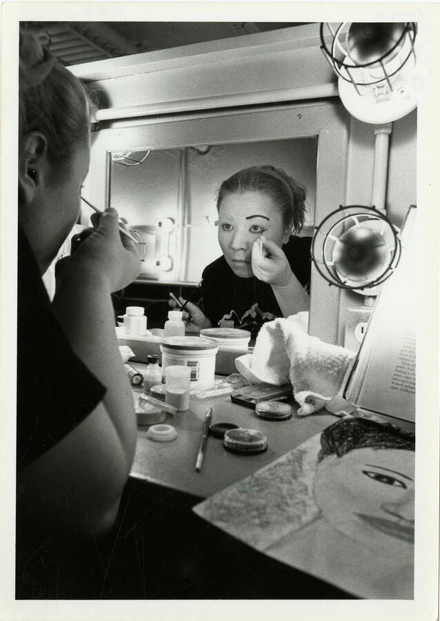 ITU Campus Notebook. Barbara Drier getting ready, doing her stage makeup, before performing as Madame Butterfly.