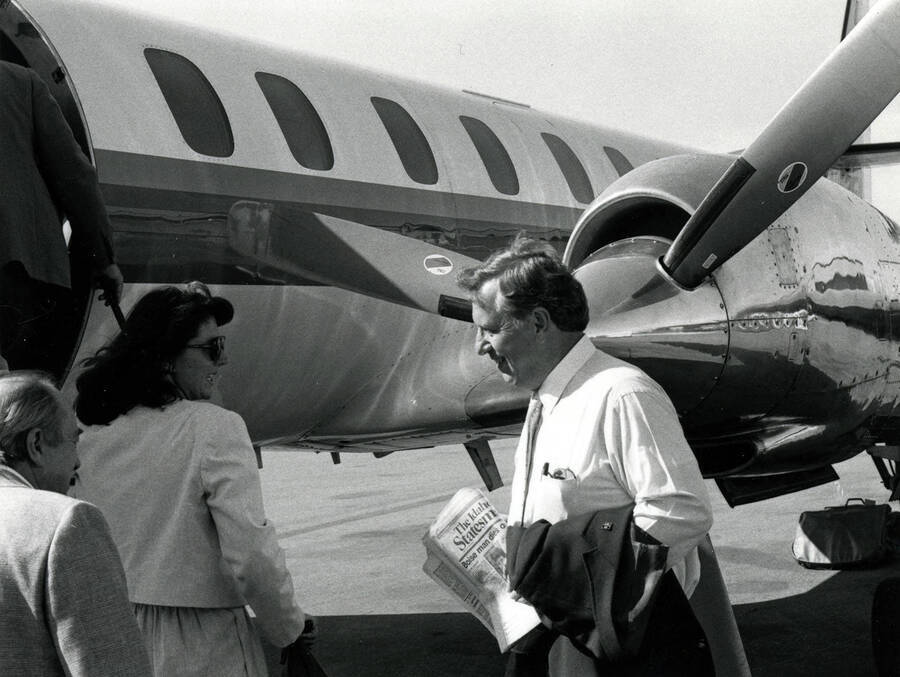 Sue Eschen and Vice President McKinney boarding an airplane.