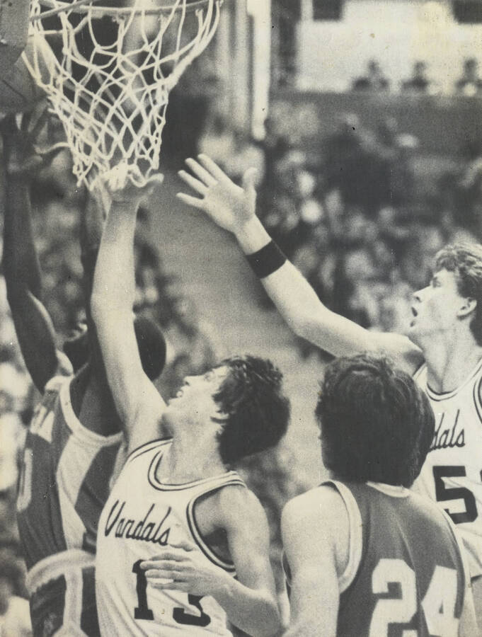 Tom Stalick (left) and Pete Reitz (right) defending the basket.