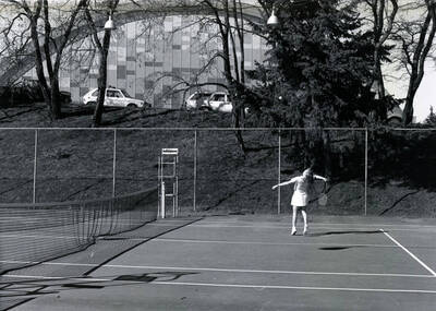Linda Voris sets up for an overhead. #4 for Idaho tennis.