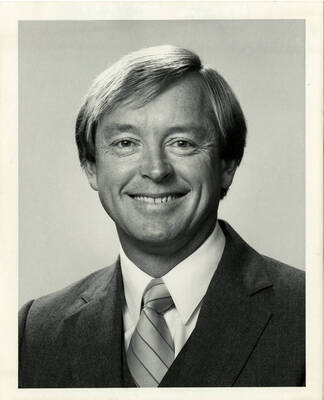 Profile photo of Jack Loughton, VP of Development, in a suit and tie.