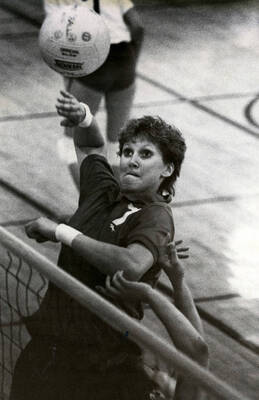 Volleyball player winding up for a shot.