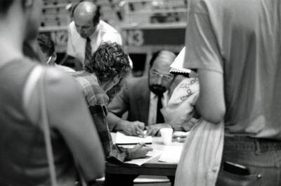 A student registering for classes in the Kibbie Dome.