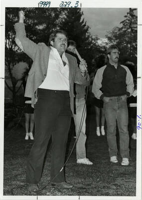 Keith Gilbertson, Idaho head football coach, giving a speech at celebratory bonfire.