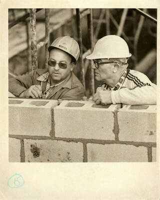 Construction workers at unfinished Kibbie Dome annex.