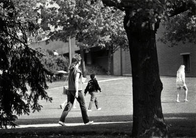 Students walking outdoors.