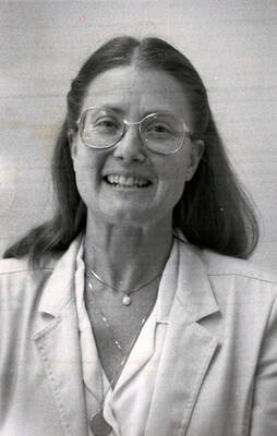 Portrait of Elinore Michel.