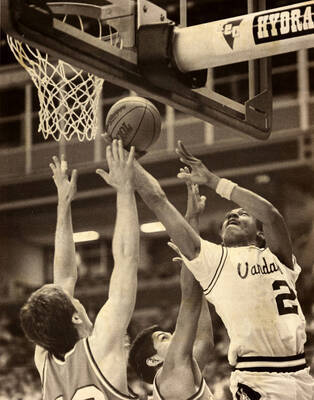 Kenny Luckett (20) going up for the rebound.