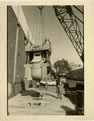Installing machinery at College of Natural Resources Building.