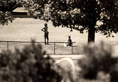 Students talking on the Admin Lawn.