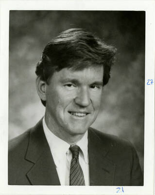 Profile photo of James H. Block in a suit and tie.