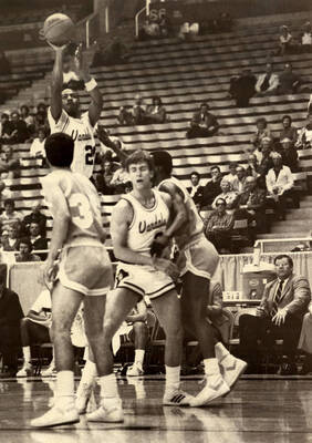 Kenny Luckett (20) shooting the basketball.