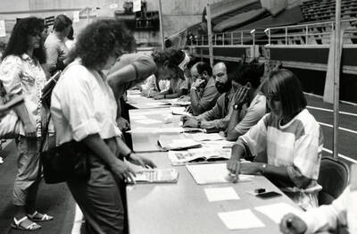 A student registering for classes in the Kibbie Dome.