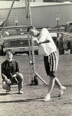 Students playing baseball.