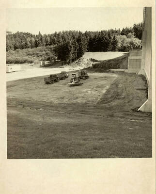 Digging foundation for Kibbie Dome annex.