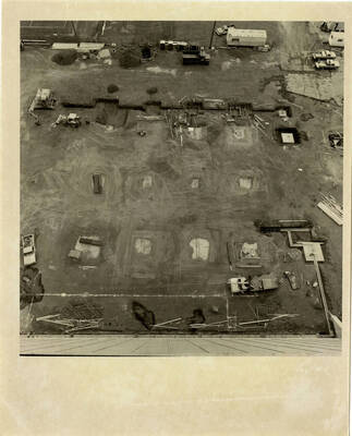 Digging foundation for Kibbie Dome annex.