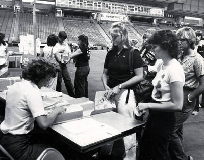 Students waiting in line to register for their classes.