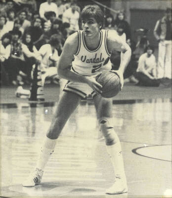 Vandals basketball player Chris Carey with the ball.
