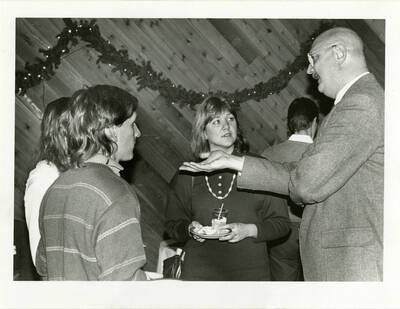 December graduates discuss career goals with Terry Armstrong at the Sarb dinner in honor of fall graduation.