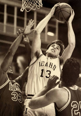 Tom Stalick (13) going up for the shot.