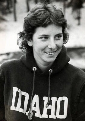 A woman wearing an Idaho sweater.