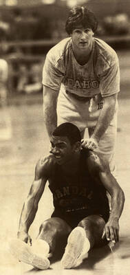 Ken Hobart, Idaho quarterback, with Vandal basketball player Ulf Spears.