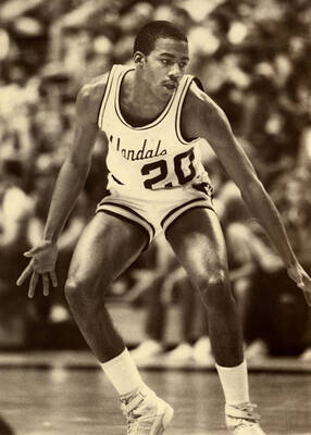 Kenny Luckett (20) on the court.