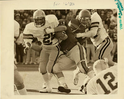 Idaho running back Todd Hoiness carries the ball in a 21-14 win over Boise State University at Bronco Stadium.