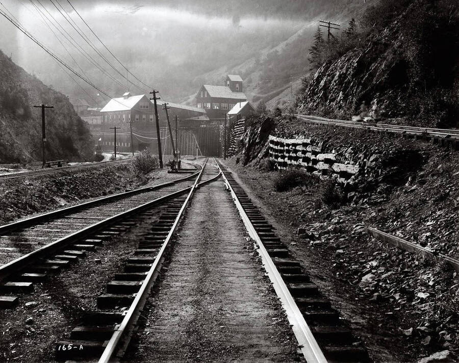 View of railroad tracks. Caption on front: "Northern Pacific Railway (tracks), Black Bear (Black Bear Accident)."