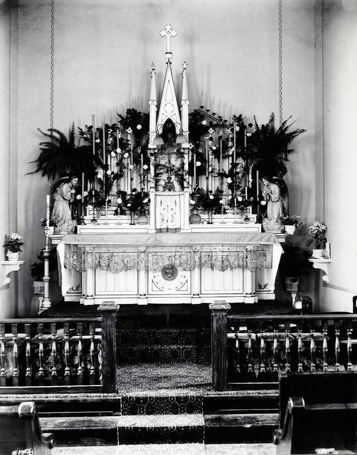 Interior of St. Alphonsus Catholic Church showing flowers on Easter Sunday April 20, 1919