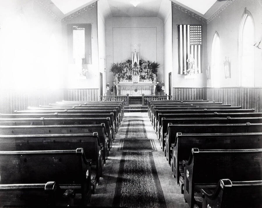 Interior of St. Alphonsus Catholic Church in Wallace showing flowers Easter Sunday, April 20, 1919.