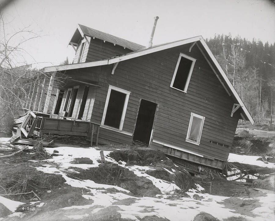 Damaged Williams house located below Cataldo, Idaho, March 15, 1918.