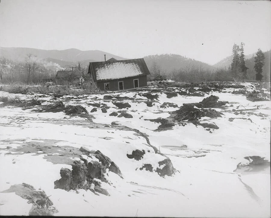 Damaged Williams house located below Cataldo, Idaho, March 15, 1918.